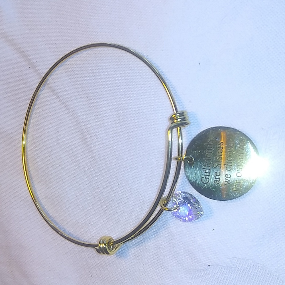 Adjustable gold tone bracelet